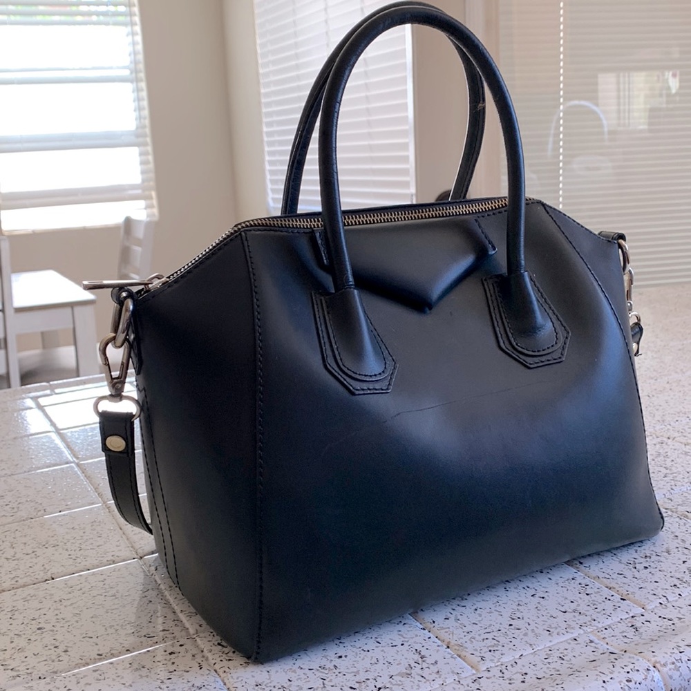 Black purse with strap